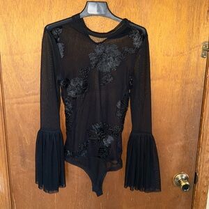 Bodysuit black lace with appliqués on the front
